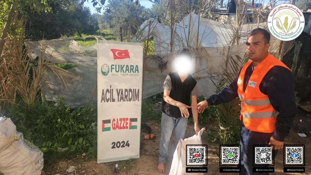 مشروع توزيع الطحين على الأسر النازحة بغزة